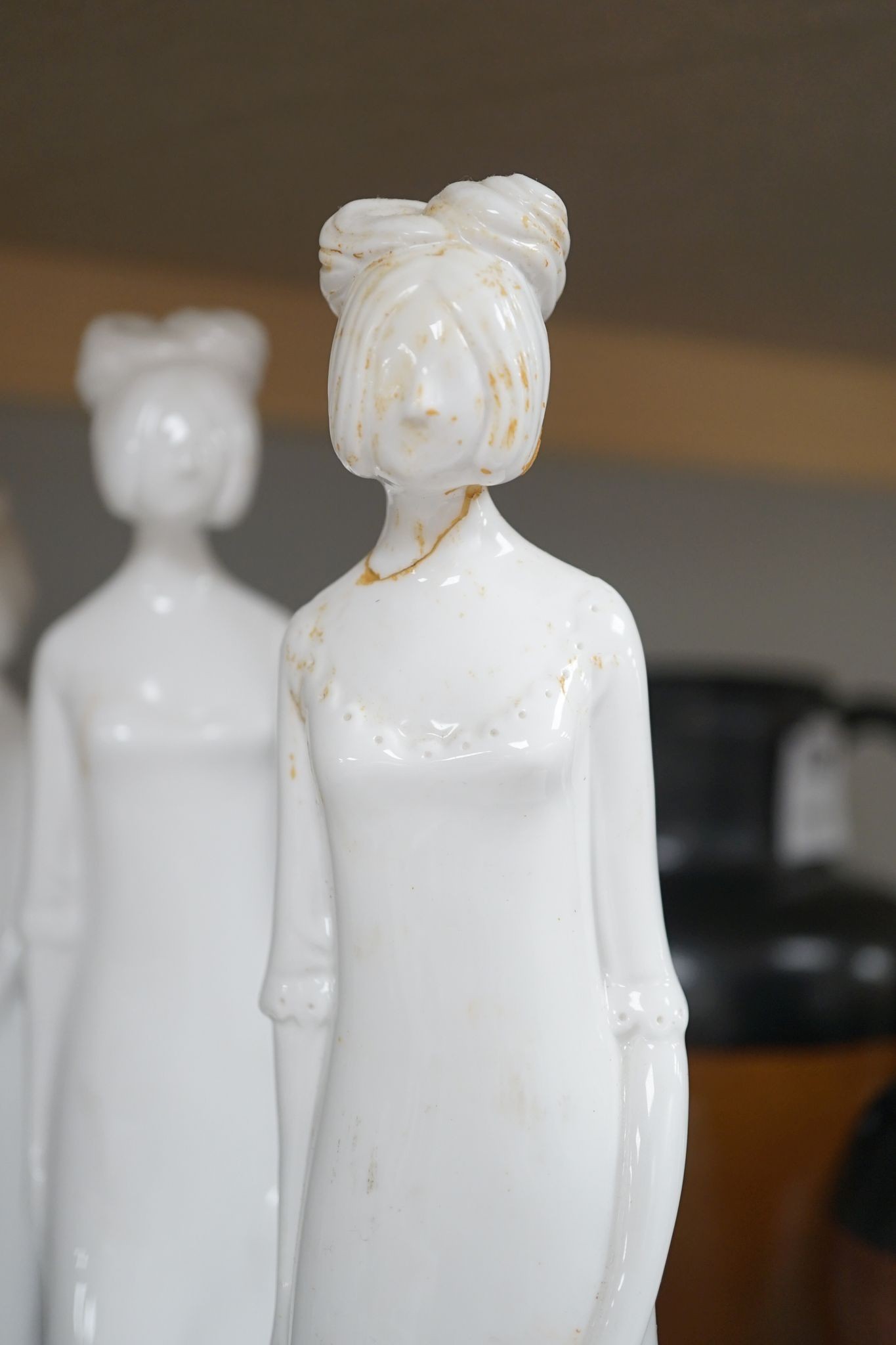 Eight Spode white glazed porcelain figures of elegant ladies by Pauline Shone 27cm